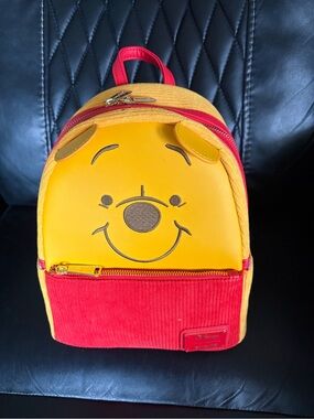 Loungefly Winnie the Pooh Mini Backpack - Yellow & Red